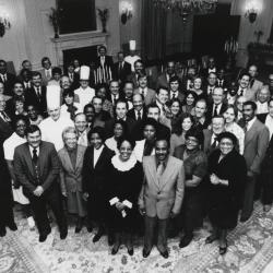 This group photograph of the White House Residence staff was taken in the State Dining Room on January 6, 1982, during the administration of President Ronald Reagan. Wilson Jerman stands in the front row. 